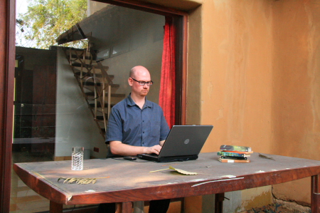 David writing Sub Rosa at the Global Arts Village in Delhi, India. Feb 08