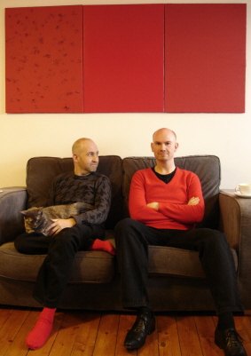 David Leddy (right) with his partner Calum McCallum at home